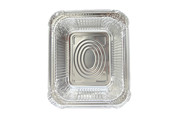 What are the advantages of disposable aluminum foil trays over other trays when used in a microwave or oven?